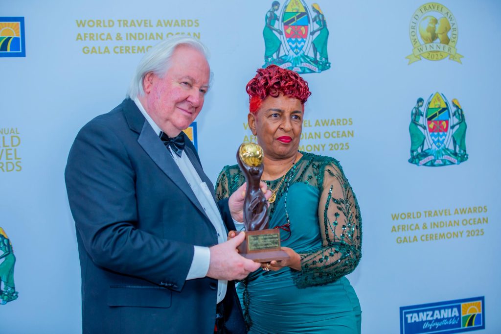 zainab receiving award